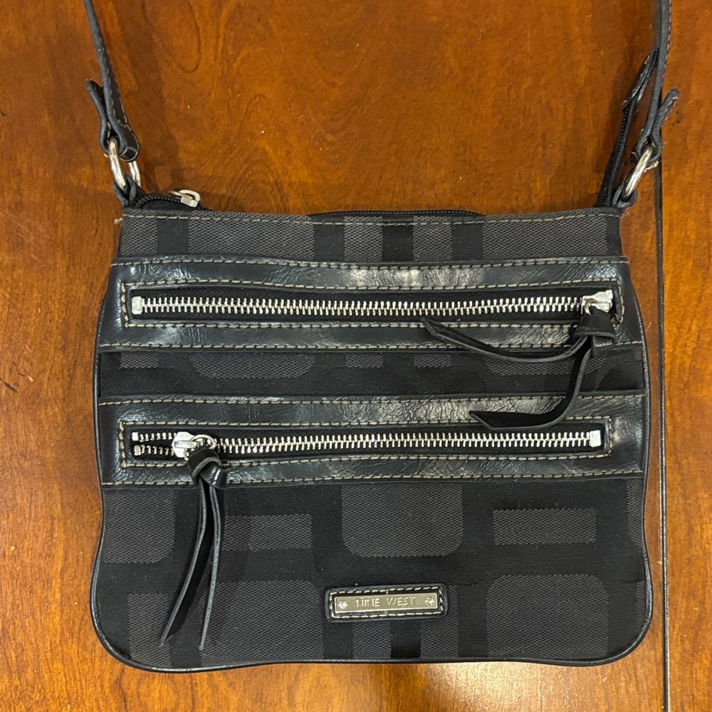 The Nine West Crossbody Bag with Zipper and Leather Accents